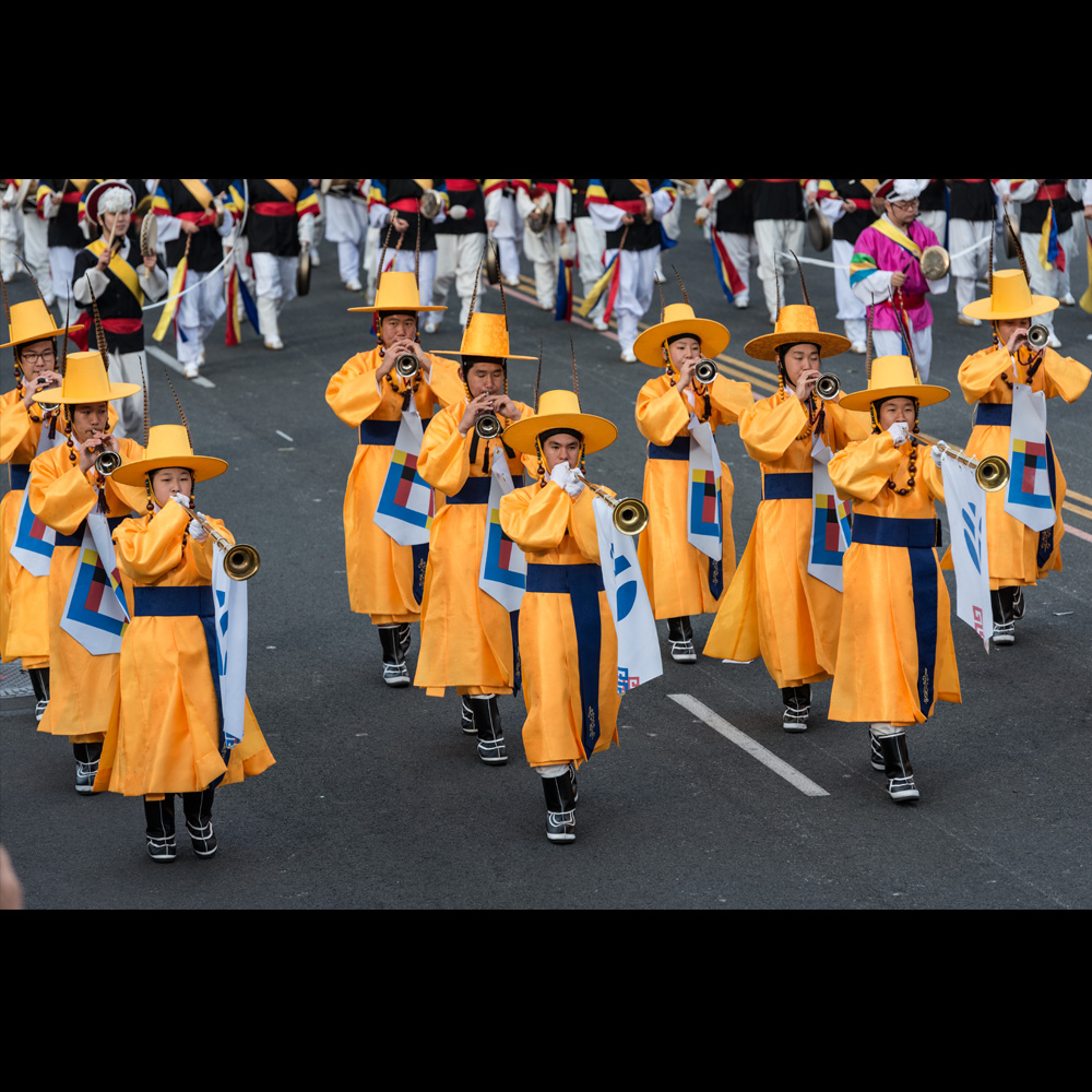 Members of the PAVA World Korean Traditional Marching Band.