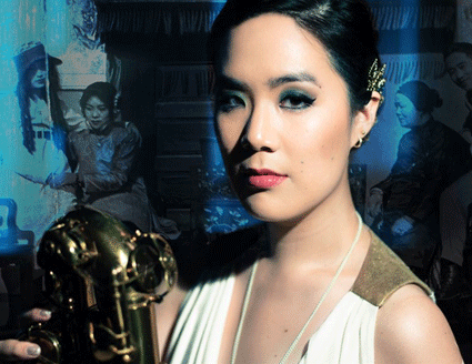 Musician Stephanie Chou wearing a white gown, holding a saxophone with stills from two historic films in the background.